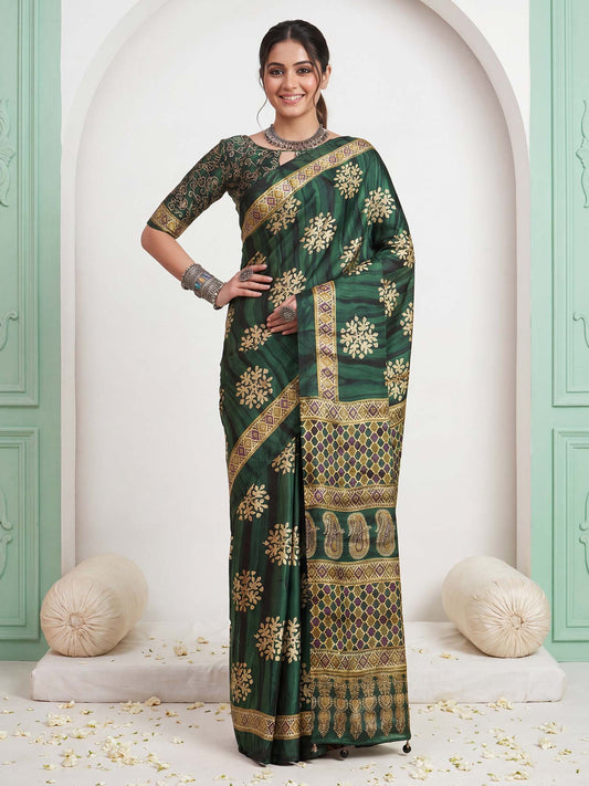 Woman wearing green pure crepe saree with ajrak block-print motif work and green blouse