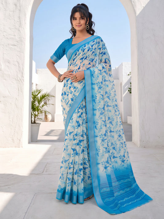 Woman wearing off white cotton linen saree with botanical floral and leaf design and blue blouse