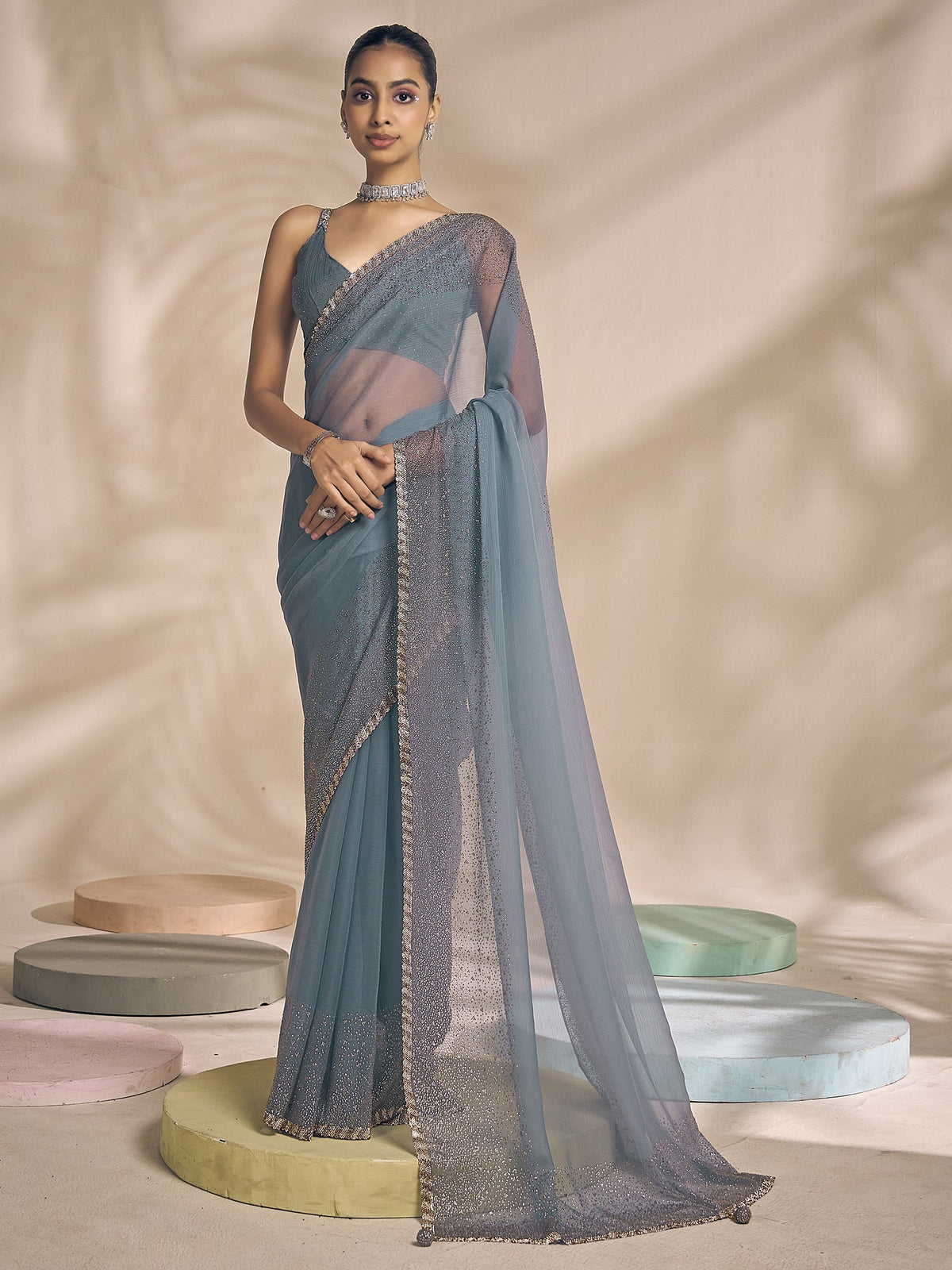 Light Blue embellished chiffon saree with light blue blouse piece