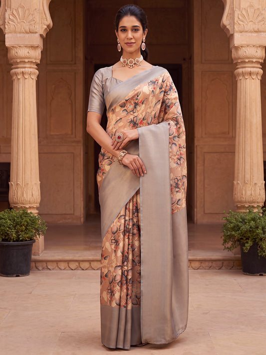 Woman wearing beige silk blend saree with all-over floral design and grey blouse