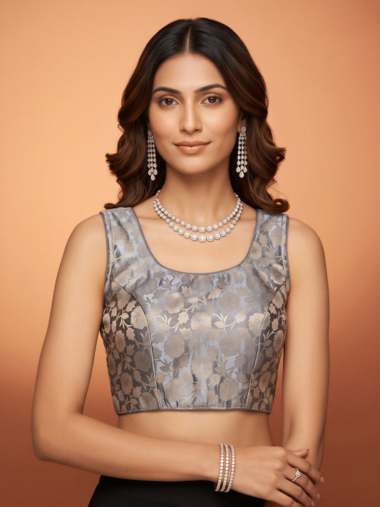 Silver woven brocade silk blend sleeveless readymade saree blouse with round neck