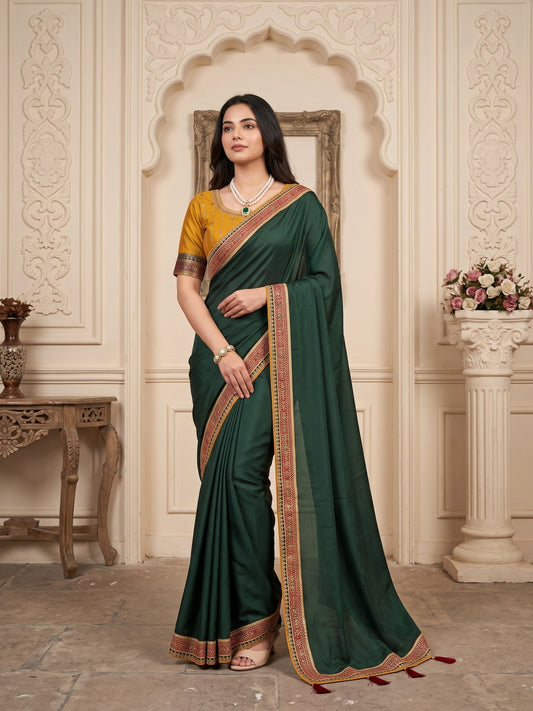 Woman wearing green vichitra silk saree with clean solid-tone finish and mustard blouse
