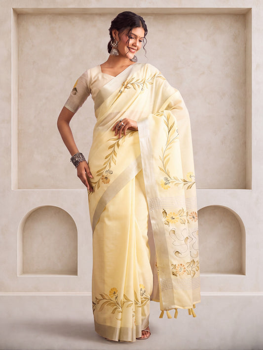 Woman wearing lemon yellow linen saree with traditional indian motif work and lemon yellow blouse
