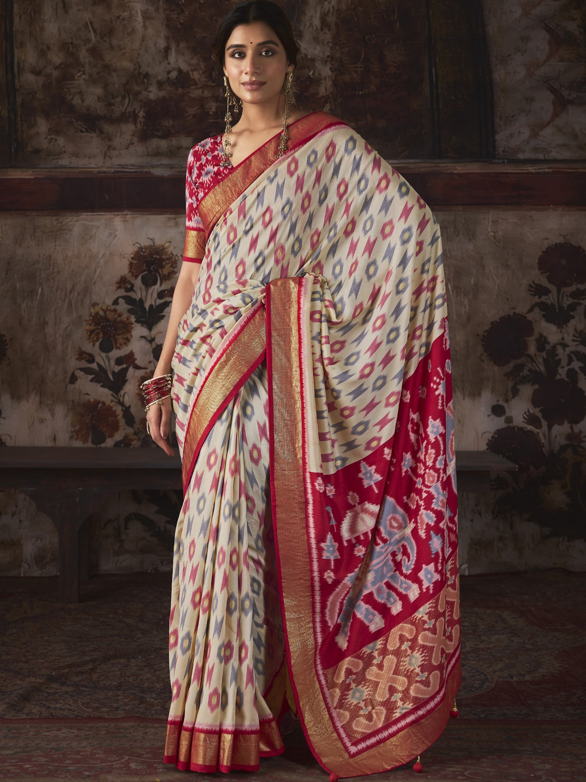 Off White ikat silk blend saree with pink blouse piece