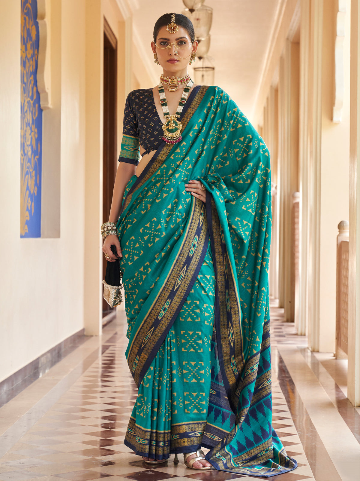 Teal Blue ikat silk blend saree with navy blue blouse piece