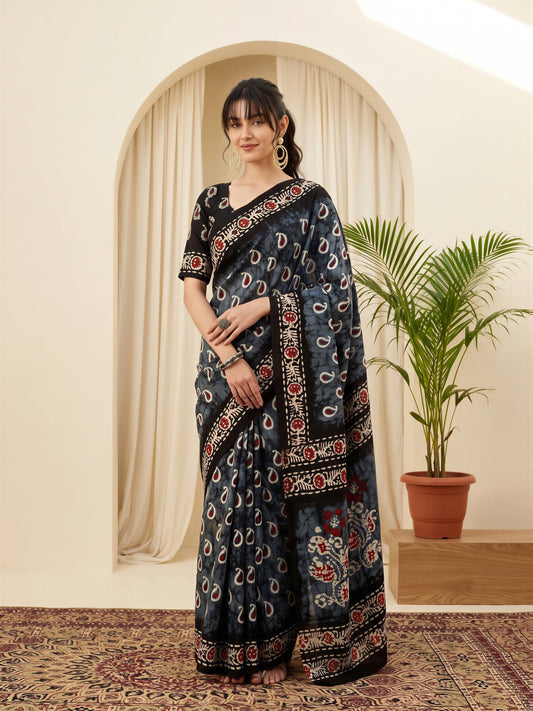 Woman wearing charcoal grey bhagalpuri silk saree with bagru hand block-print work and black blouse