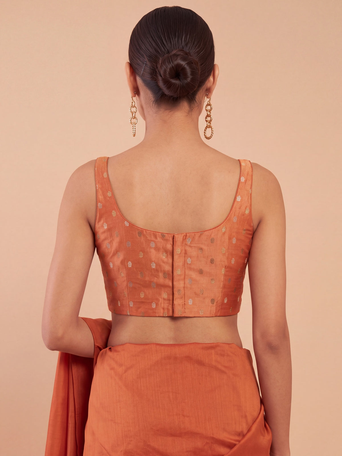 Orange zari woven georgette sleeveless readymade saree blouse with round neck view 1