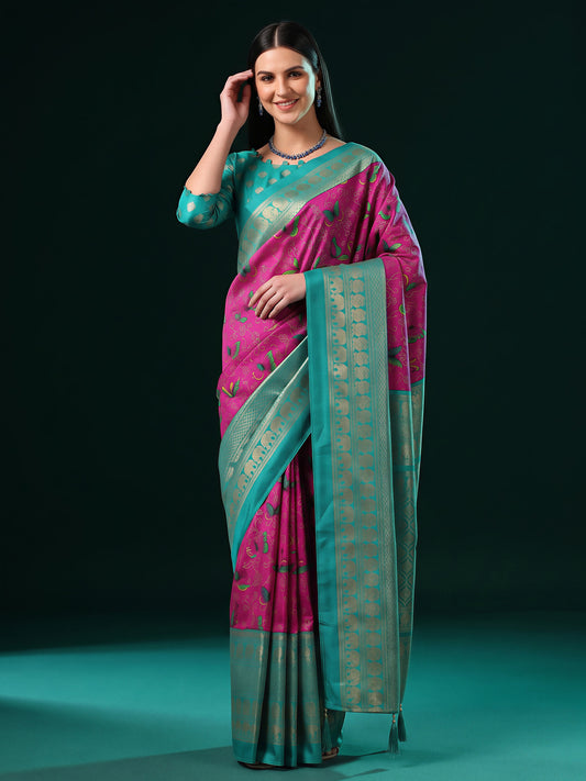 Woman wearing magenta cotton blend saree with butterfly motif design and aqua blue blouse