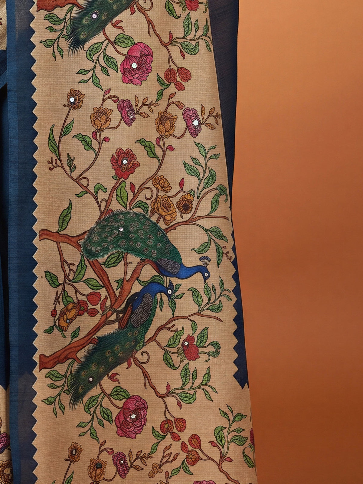 Pallu detail of navy blue linen blend saree showing kalamkari narrative motif work and printed border