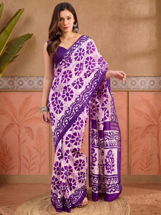 Woman wearing purple bhagalpuri silk saree with batik wax-resist design and purple blouse
