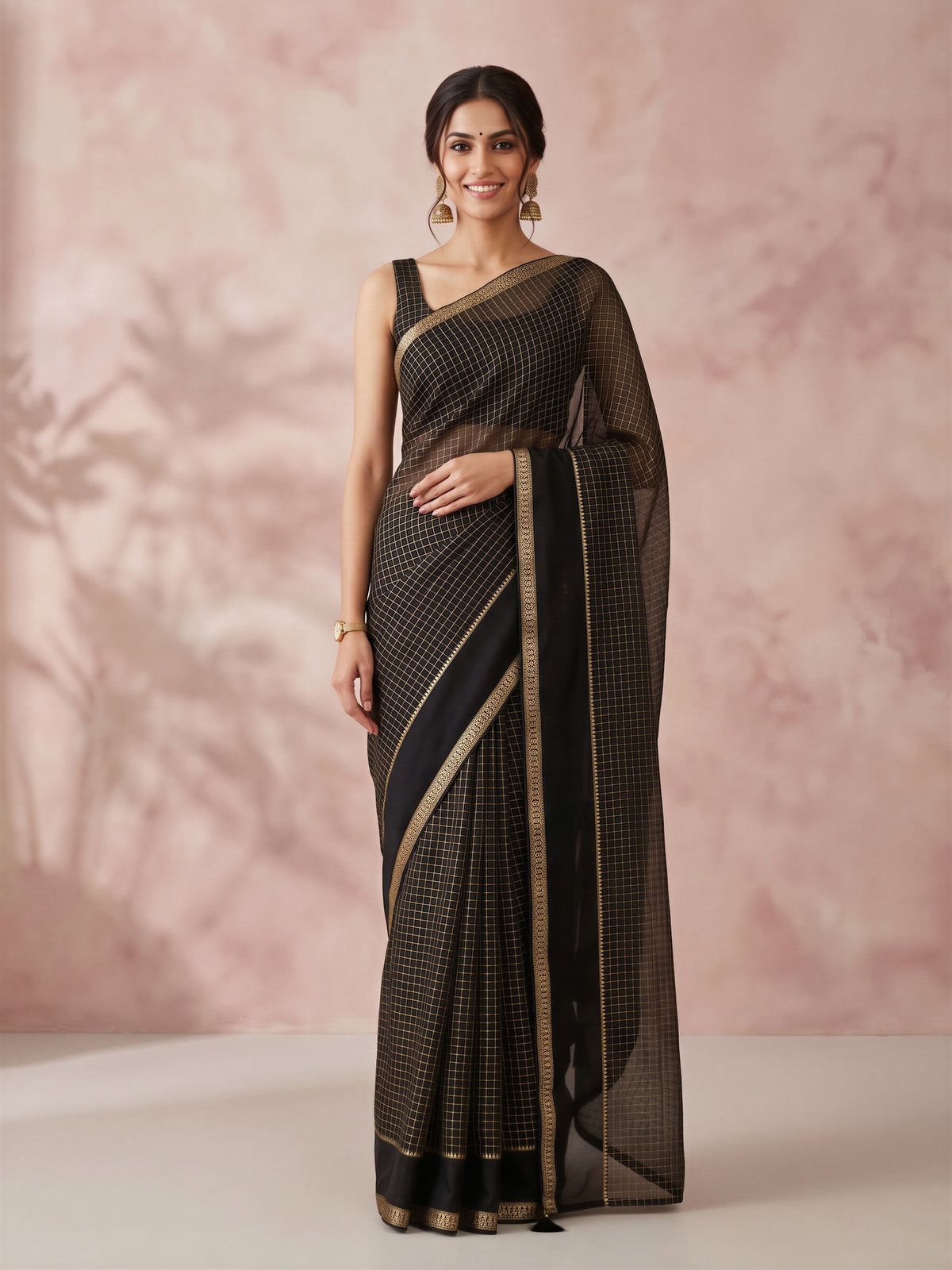 Woman wearing black viscose saree with checked pattern design and black blouse