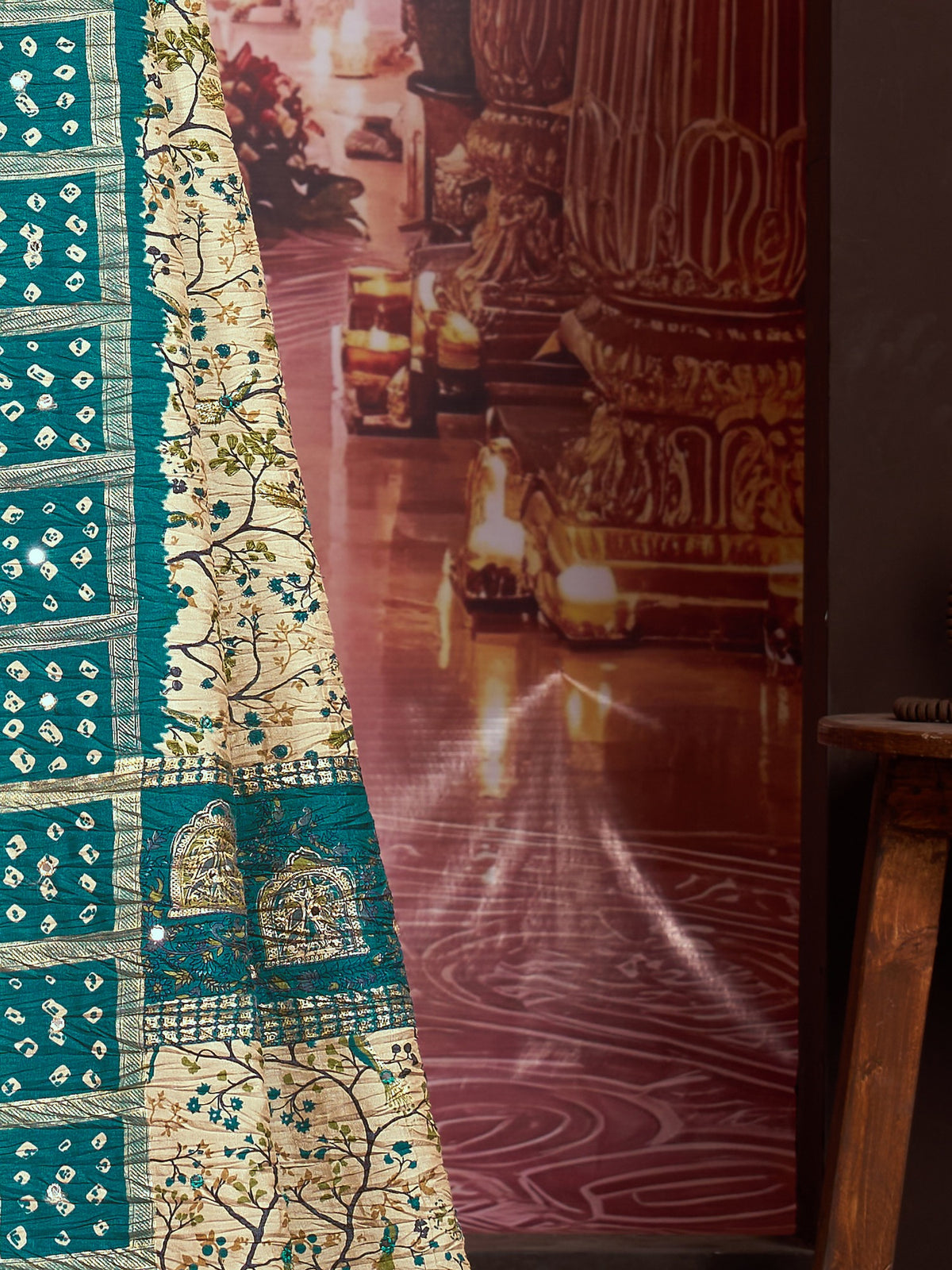 Pallu detail of cream tussar silk saree showing traditional indian motif work and printed border