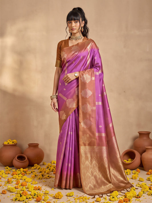 Woman wearing purple cotton blend saree with ornamented surface design and bronze blouse
