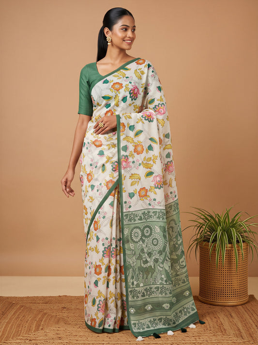Woman wearing off white linen blend saree with botanical floral and leaf design and green blouse
