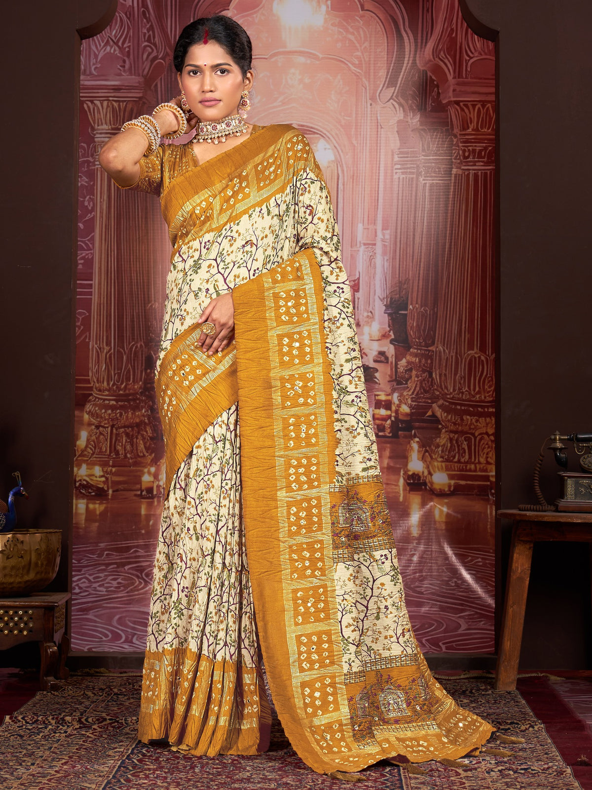 Cream ethnic motif tussar silk saree with mustard blouse piece