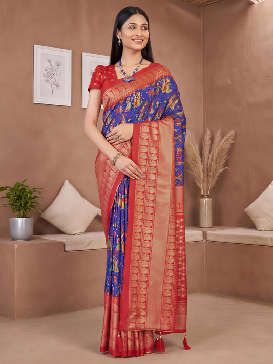 Woman wearing blue cotton blend saree with traditional indian motif work and red blouse