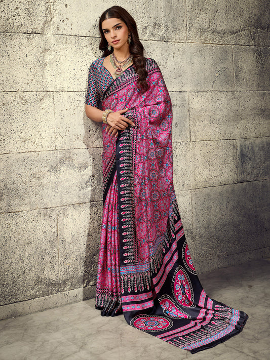 Woman wearing pink satin saree with ajrak block-print motif work and black blouse