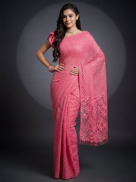 Woman wearing pink brasso saree with traditional indian motif work and pink blouse