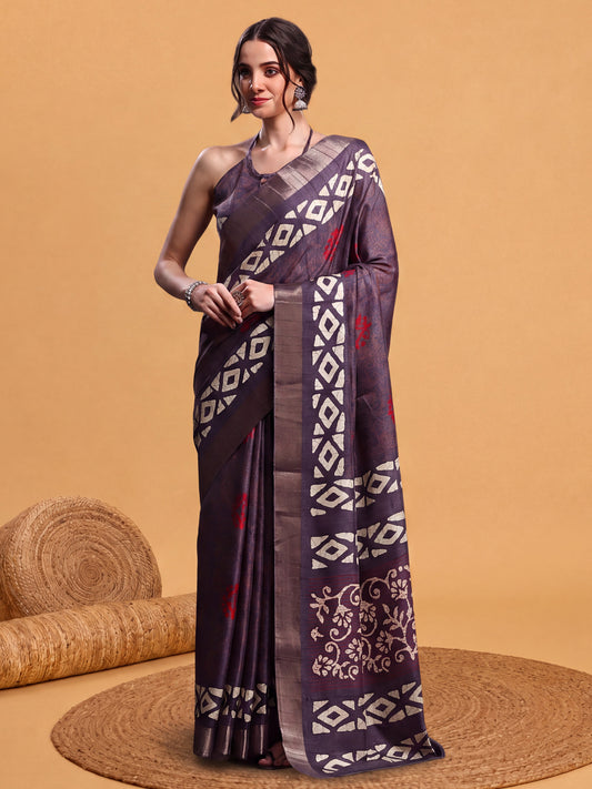 Woman wearing violet silk blend saree with hand block-printed motifs and violet blouse