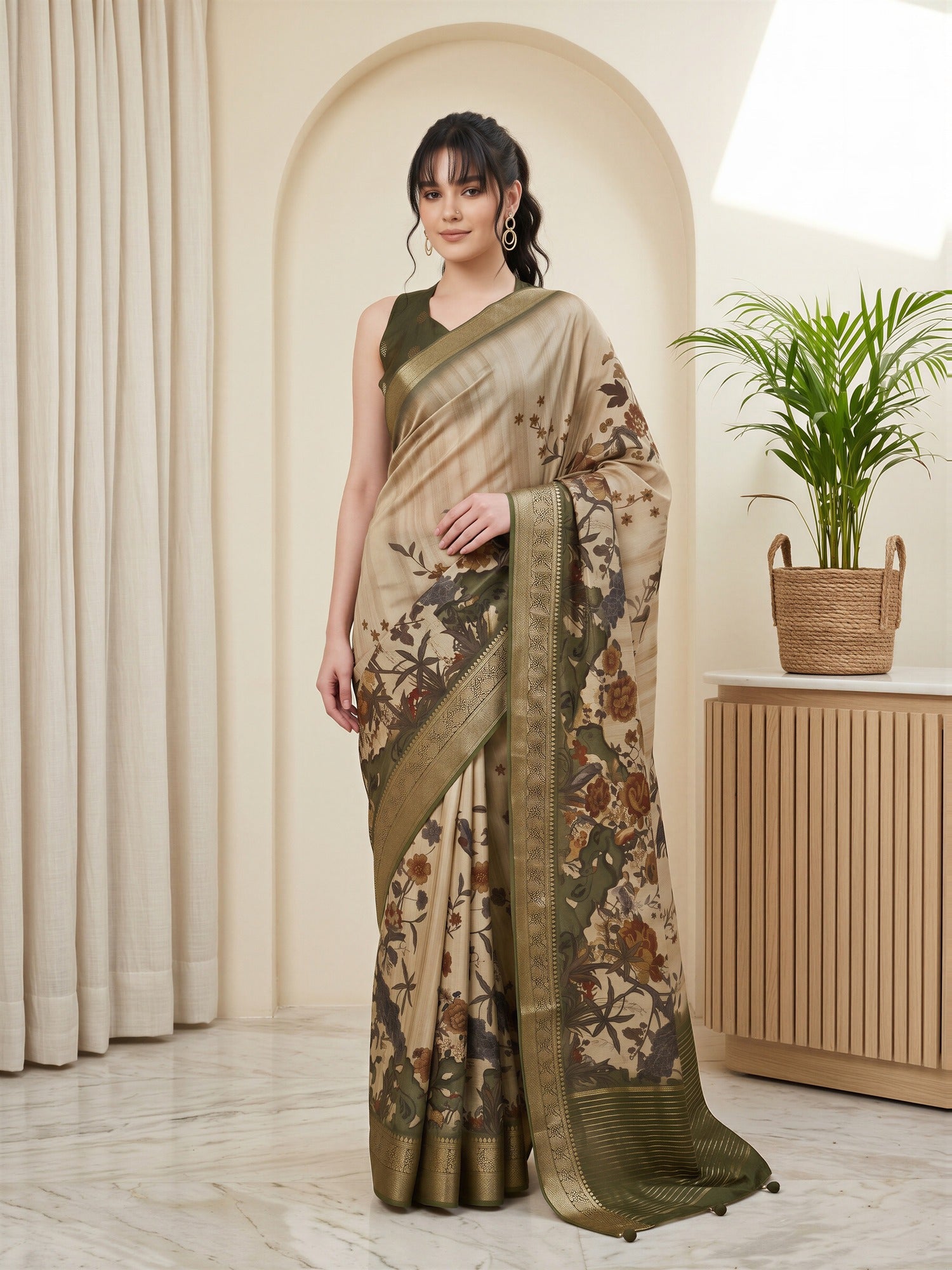 Woman wearing beige viscose silk saree with botanical floral and leaf design and olive blouse