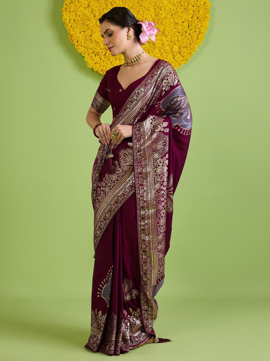Woman wearing wine silk blend saree with woven motif design and wine blouse