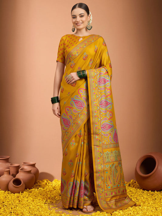 Woman wearing mustard silk blend saree with metallic foil print work and mustard blouse