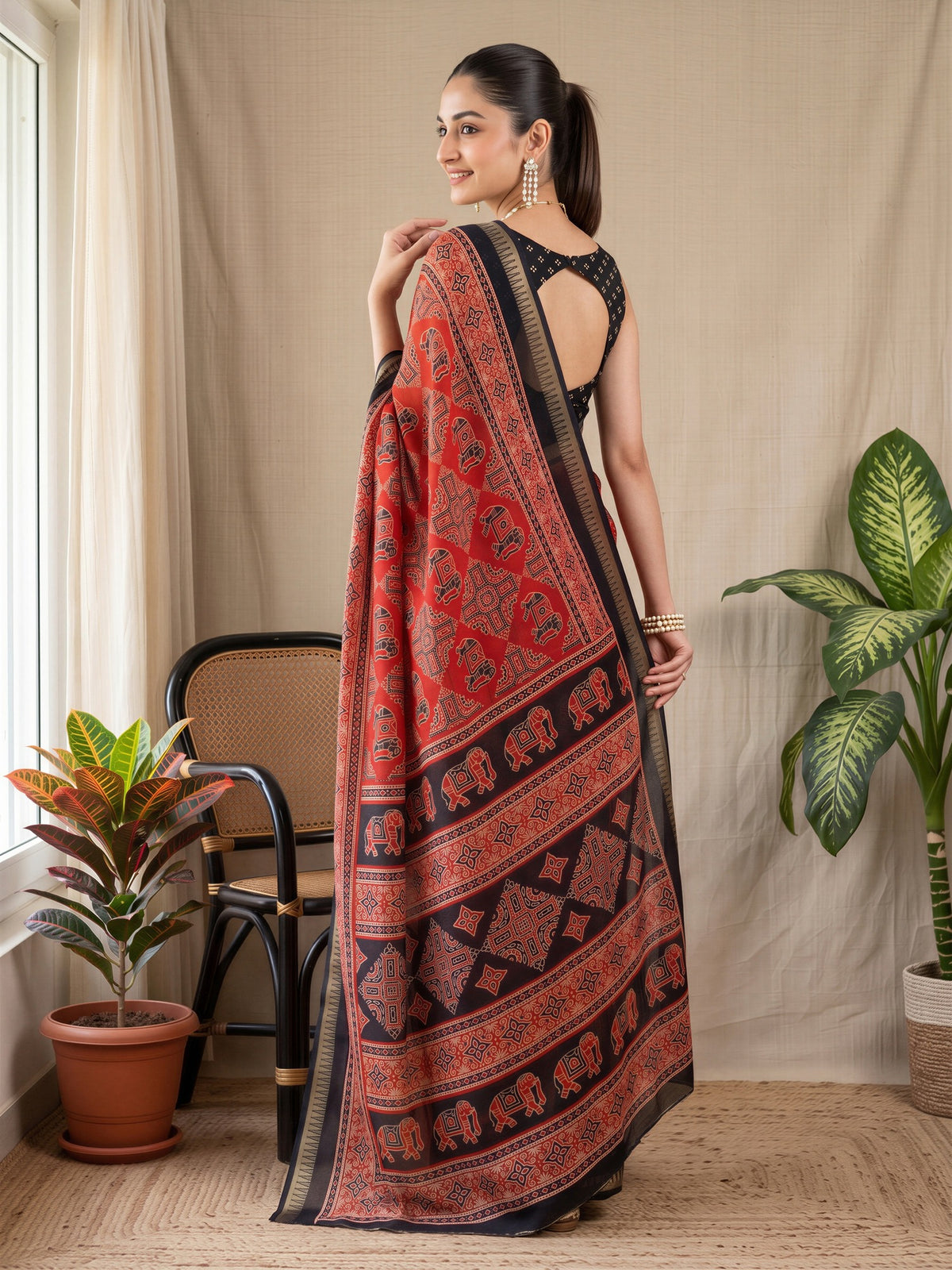 Rust Georgette saree – detail view 1
