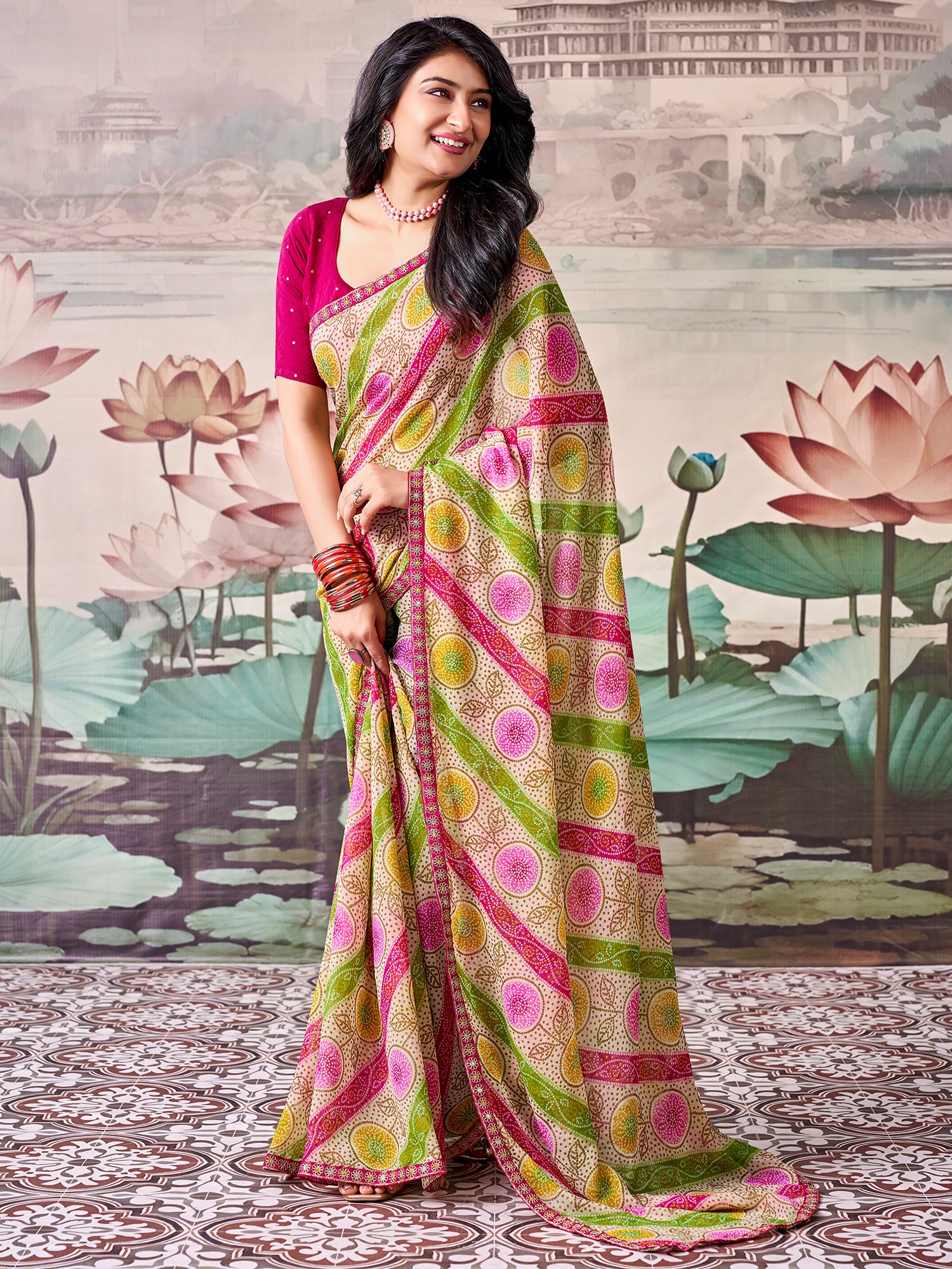 Woman wearing multicolored georgette saree with bandhani tie-dye dot work and pink blouse