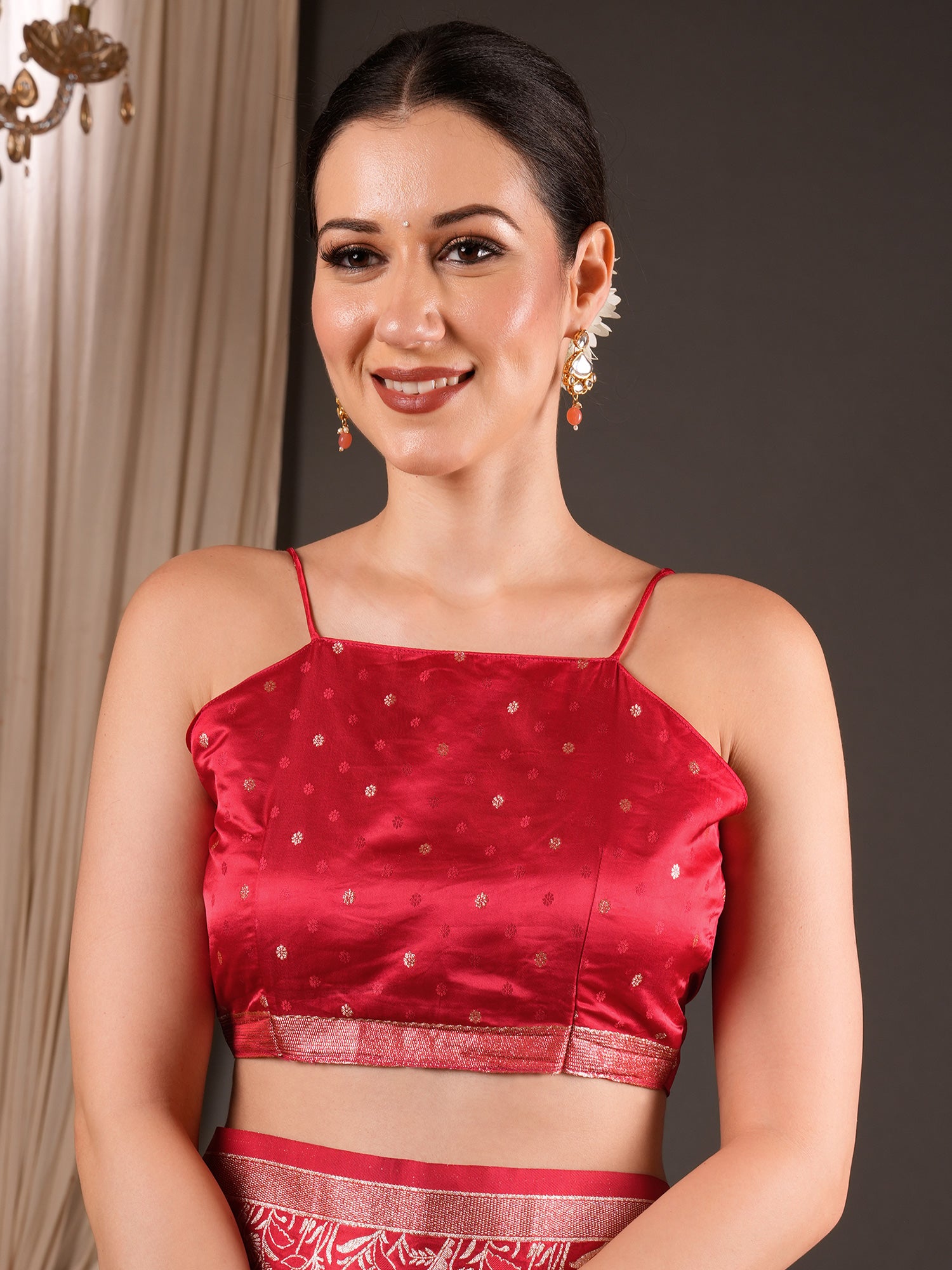 Unstitched red silk blend blouse piece with zari butta design