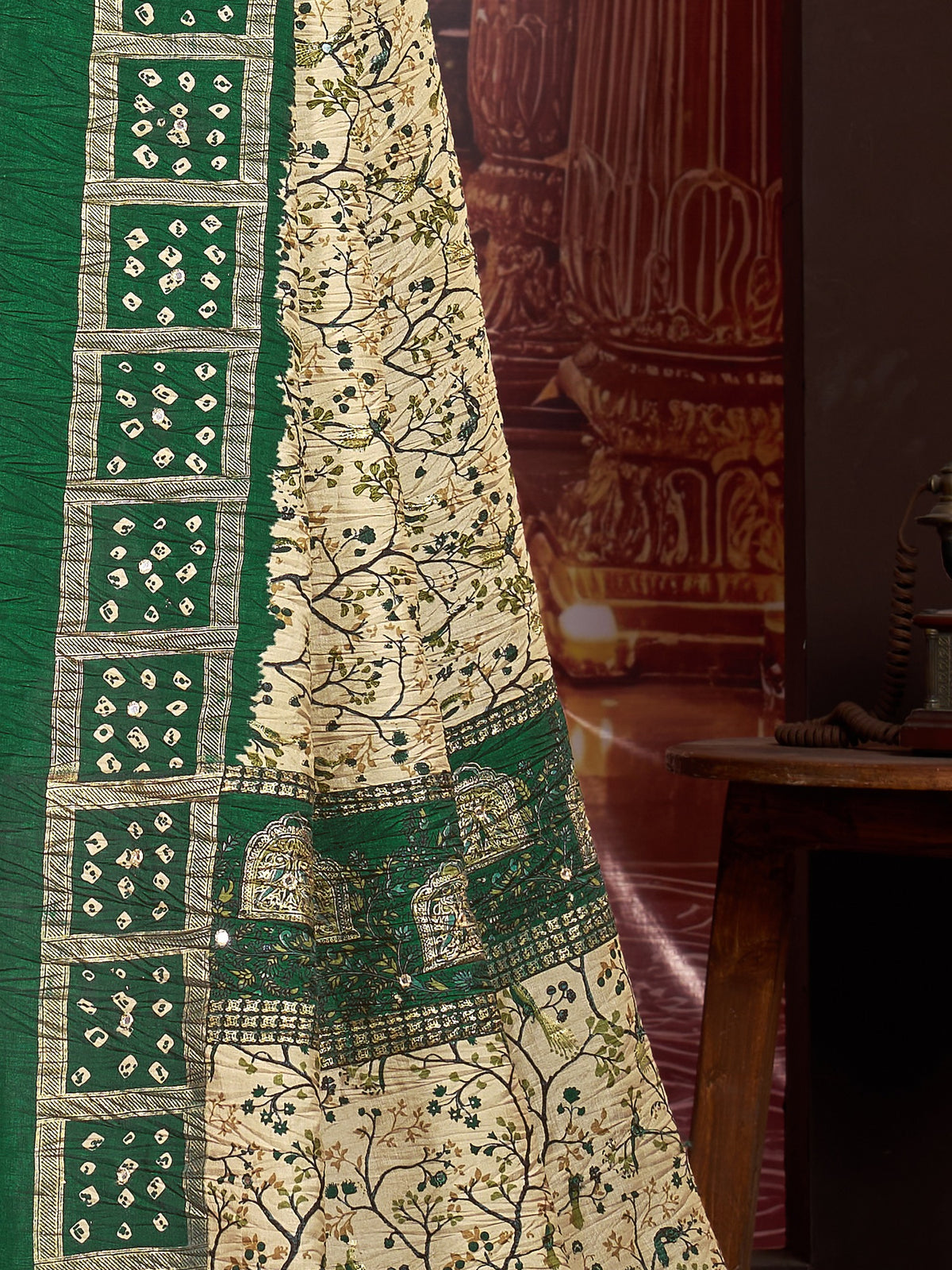 Pallu detail of cream tussar silk saree showing traditional indian motif work and printed border