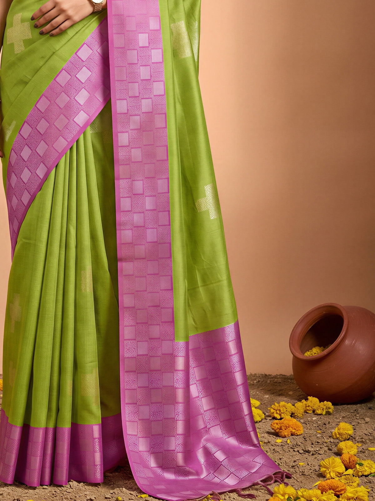 Pallu detail of sea green cotton blend saree showing traditional indian motif work and zari border