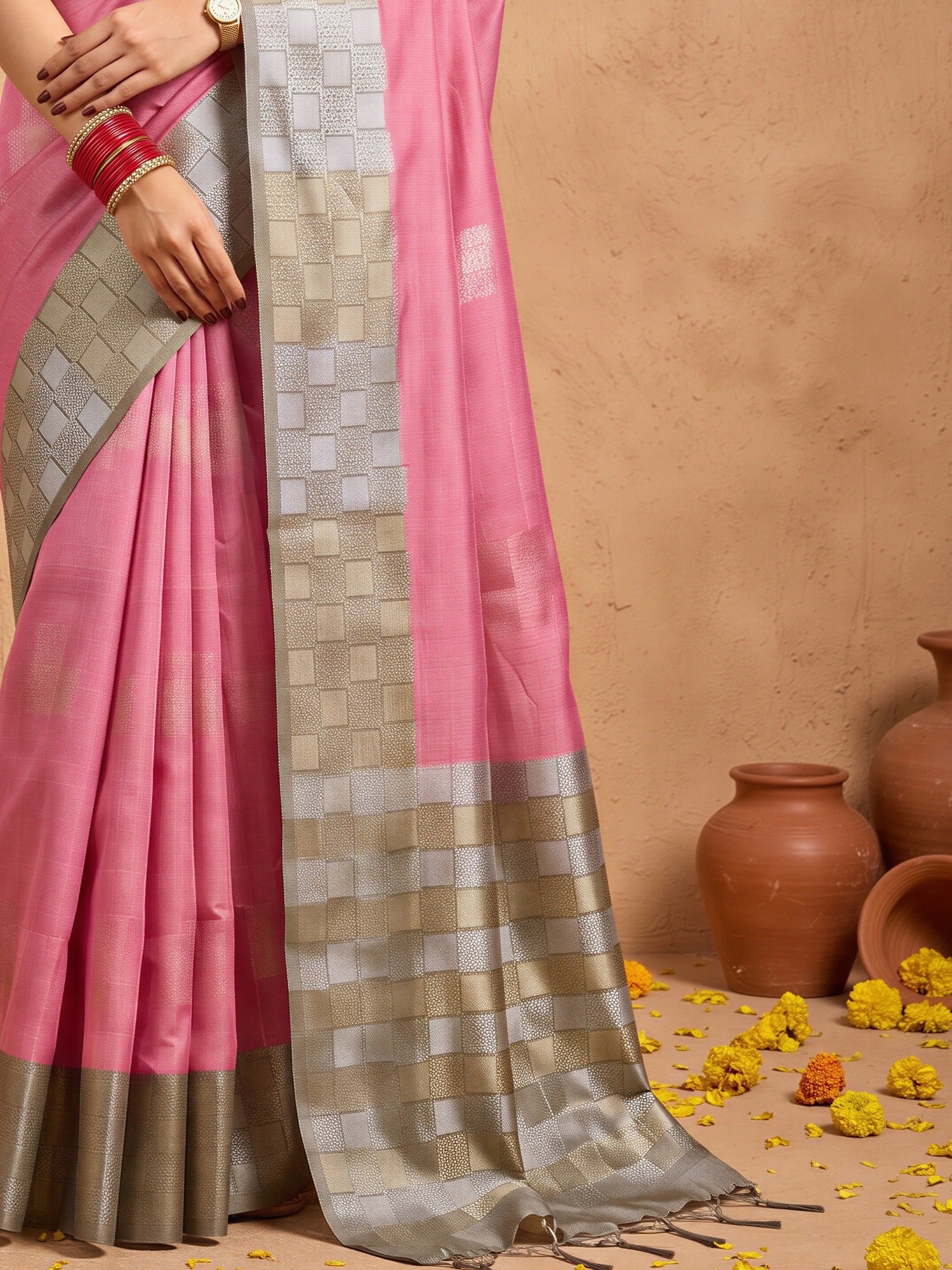 Pallu detail of pink cotton blend saree showing traditional indian motif work and zari border