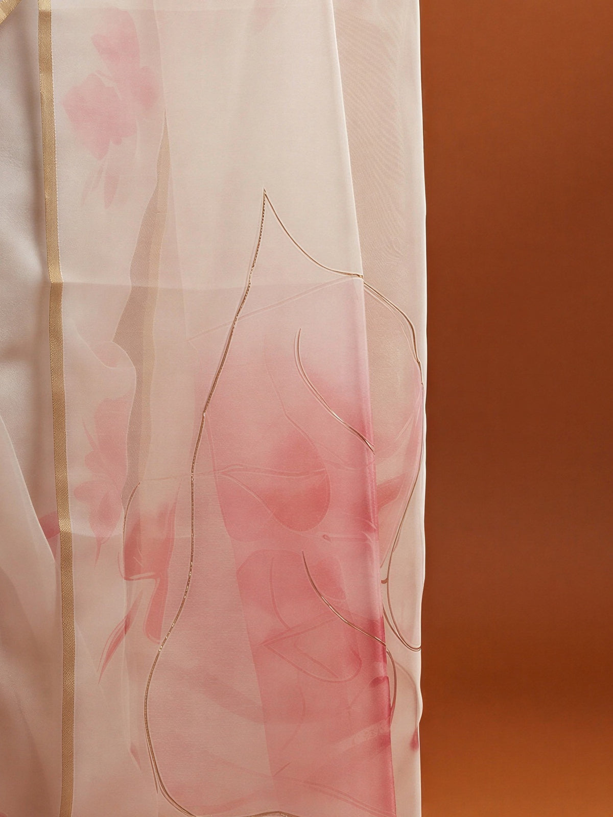 Pallu detail of white organza saree showing abstract contemporary design and zari border