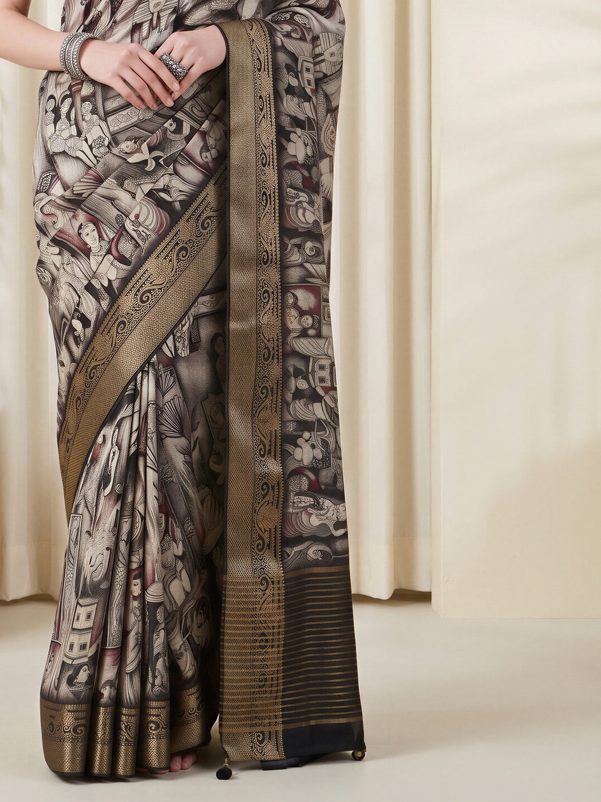 Pallu detail of navy blue viscose silk saree showing kalamkari narrative motif work and woven design border