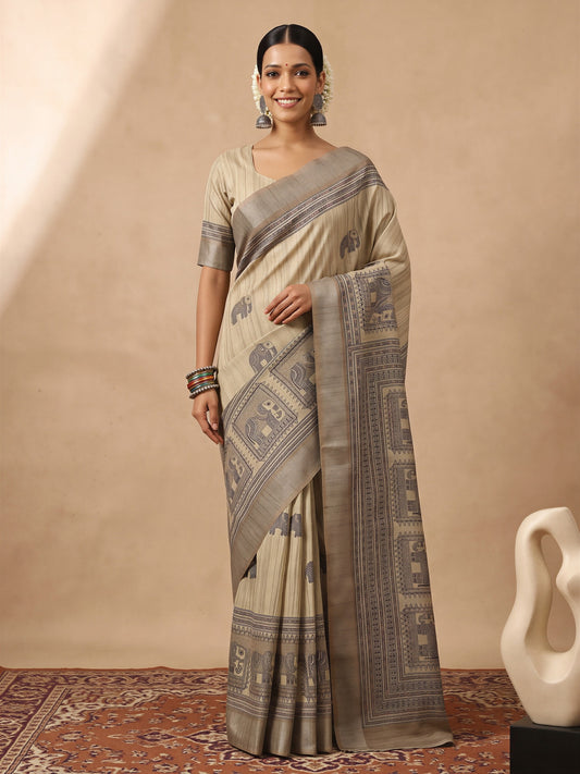 Woman wearing cream satin silk saree with hand block-printed motifs and cream blouse