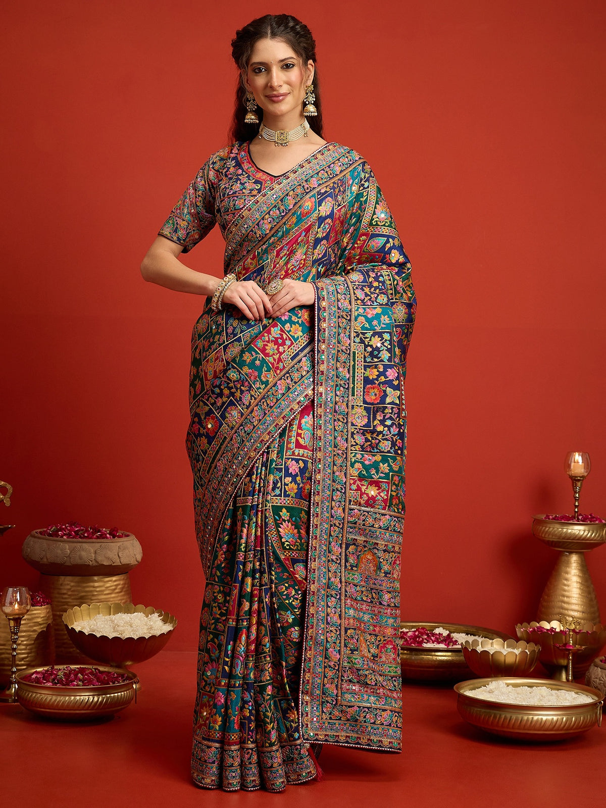 Woman wearing multicolored silk blend saree with traditional indian motif work and multicolored blouse
