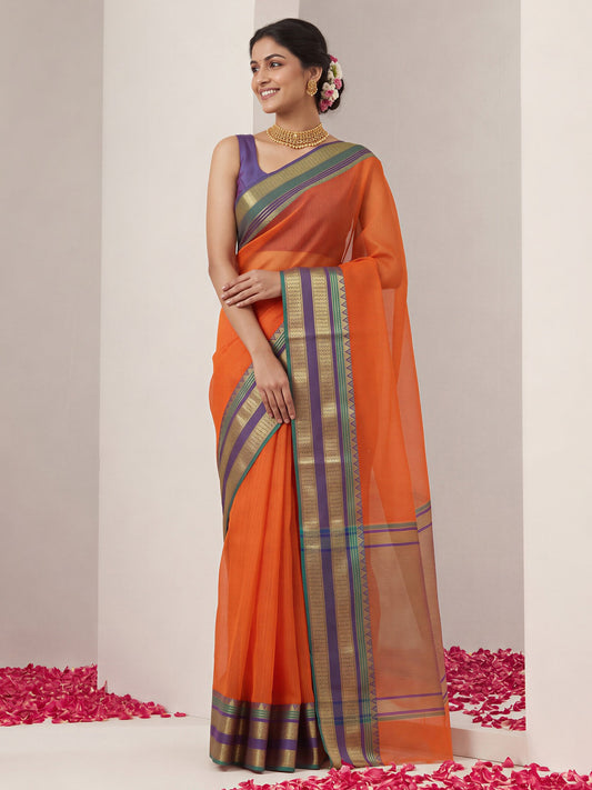 Orange solid kota doria cotton saree with navy blue blouse piece