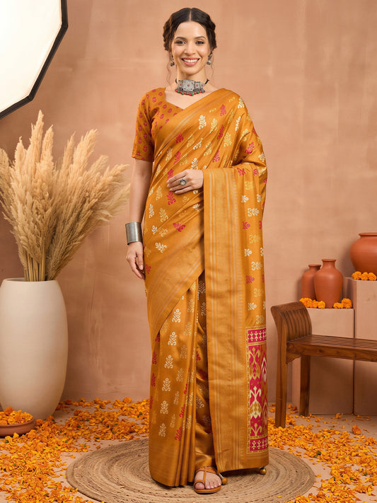 Woman wearing mustard silk blend saree with metallic foil print work and mustard blouse