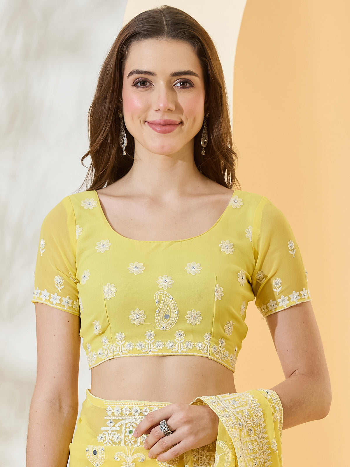 Unstitched yellow georgette blouse piece with embroidered design