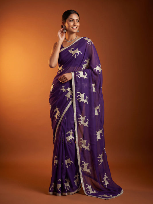 Woman wearing purple georgette saree with embroidered motif work and purple blouse