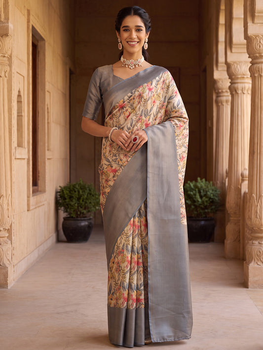Woman wearing grey silk blend saree with all-over floral design and grey blouse