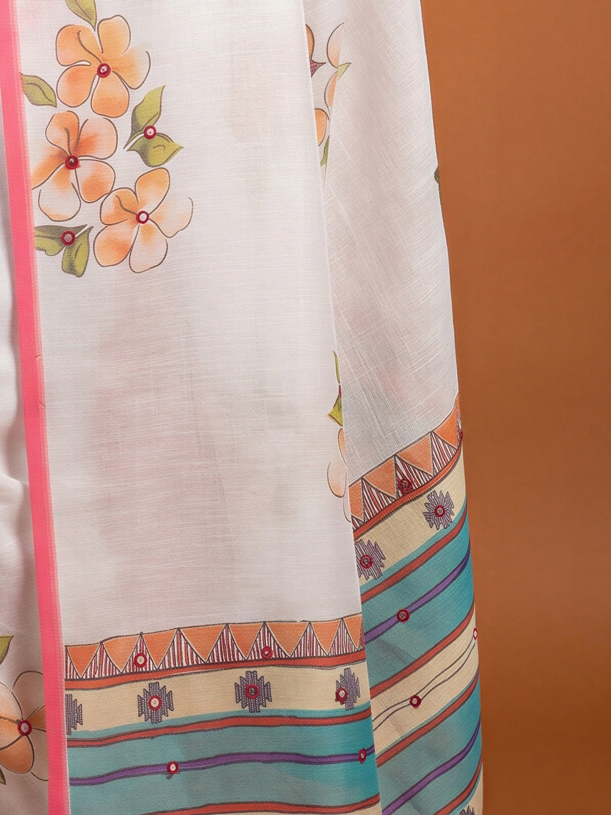 Pallu detail of off white linen blend saree showing all-over floral design and printed border
