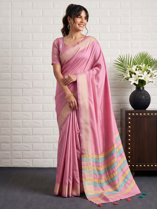Woman wearing pink bhagalpuri silk saree with traditional indian motif work and pink blouse
