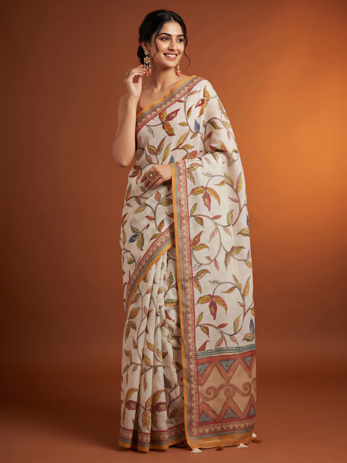 Woman wearing off white linen blend saree with botanical floral and leaf design and rust blouse