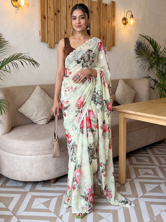 Woman wearing light green linen saree with all-over floral design and brown blouse