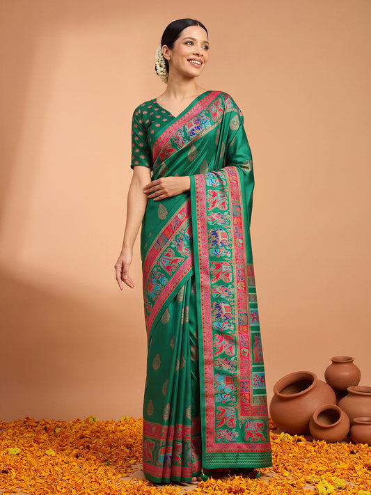 Woman wearing green silk blend saree with metallic foil print work and green blouse