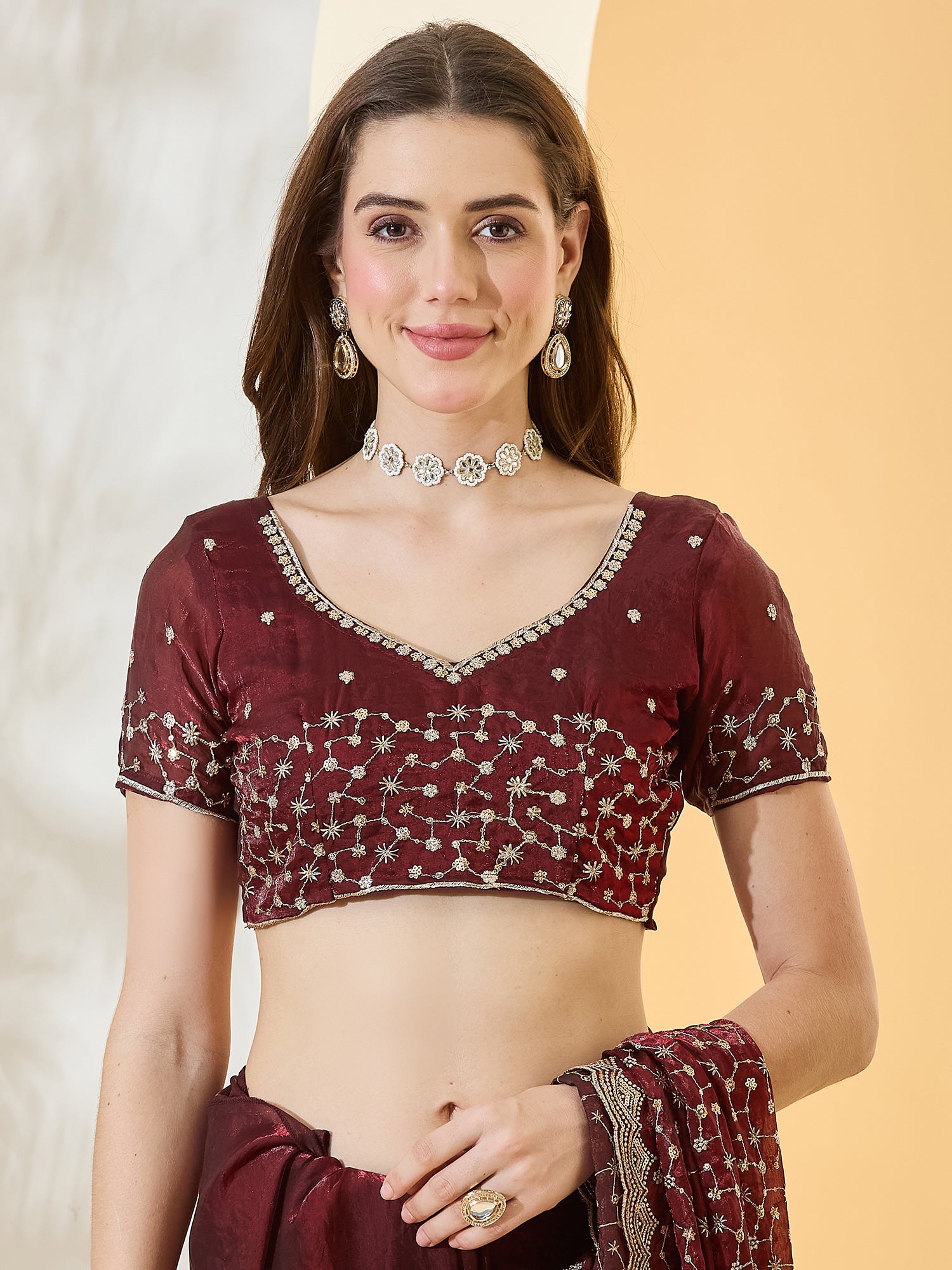 Unstitched maroon satin blouse piece with embellished design