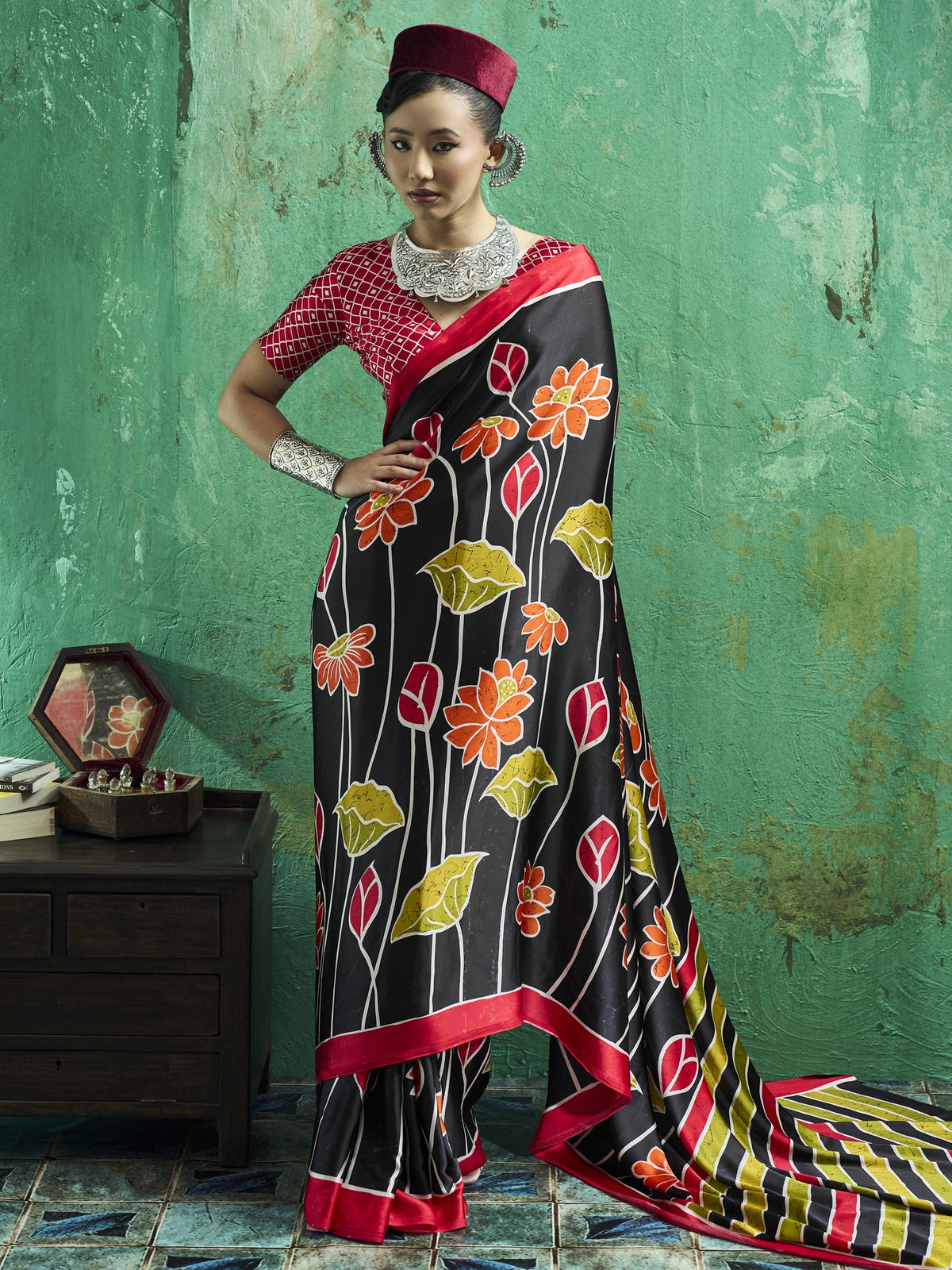 Black floral satin saree with red blouse piece