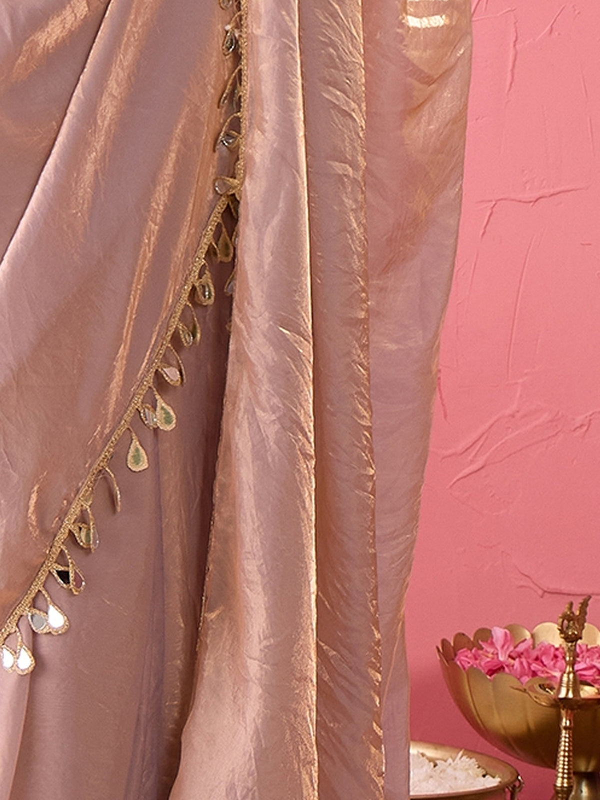 Pallu detail of metallic satin saree showing clean solid-tone finish and embellished border