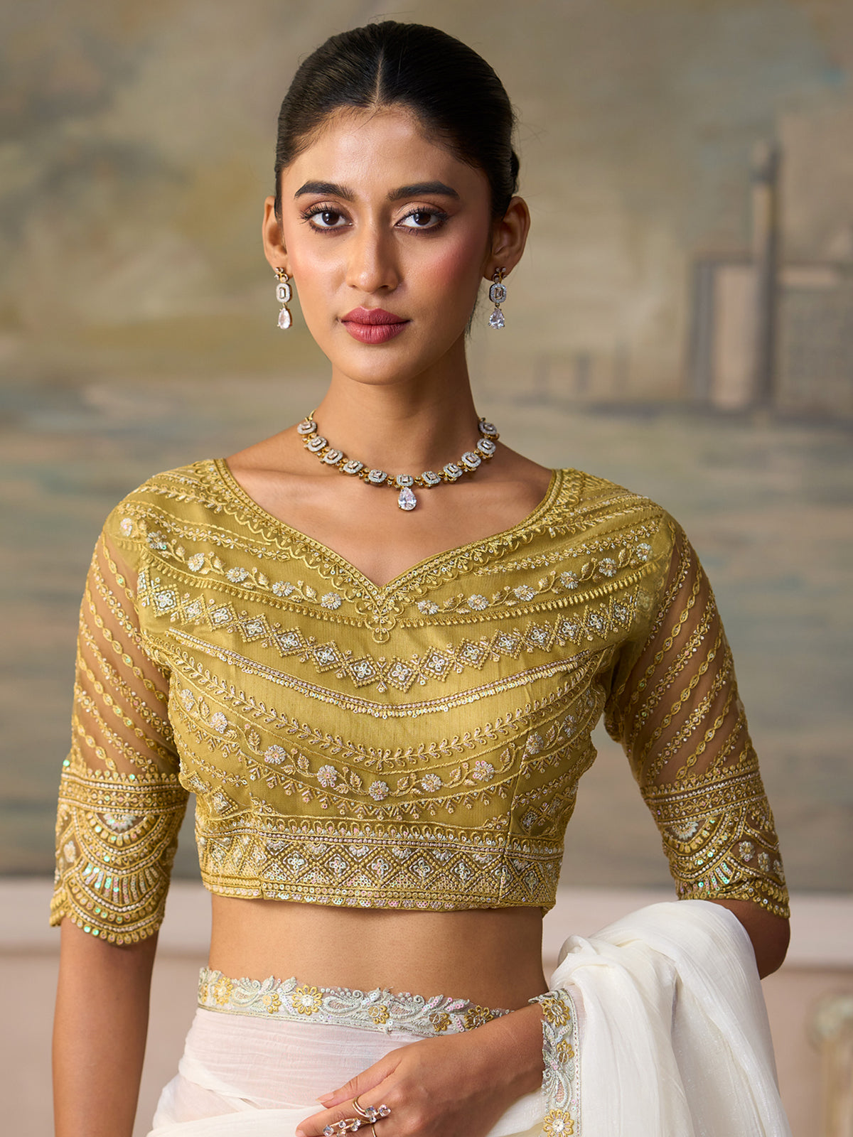 Unstitched gold tussar silk blouse piece with embellished design
